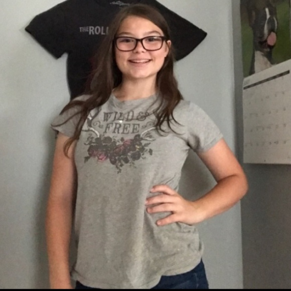 Made by Soffe and is grey size small